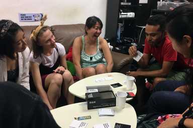 Playing Cards Against Humanity at HackerspaceSG 2017 Xmas Party Playing Cards Against Humanity at HackerspaceSG 2017 Xmas Party
